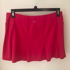 EUC.  Tail Tennis 14” long bright pink tennis skirt.  Size XL.